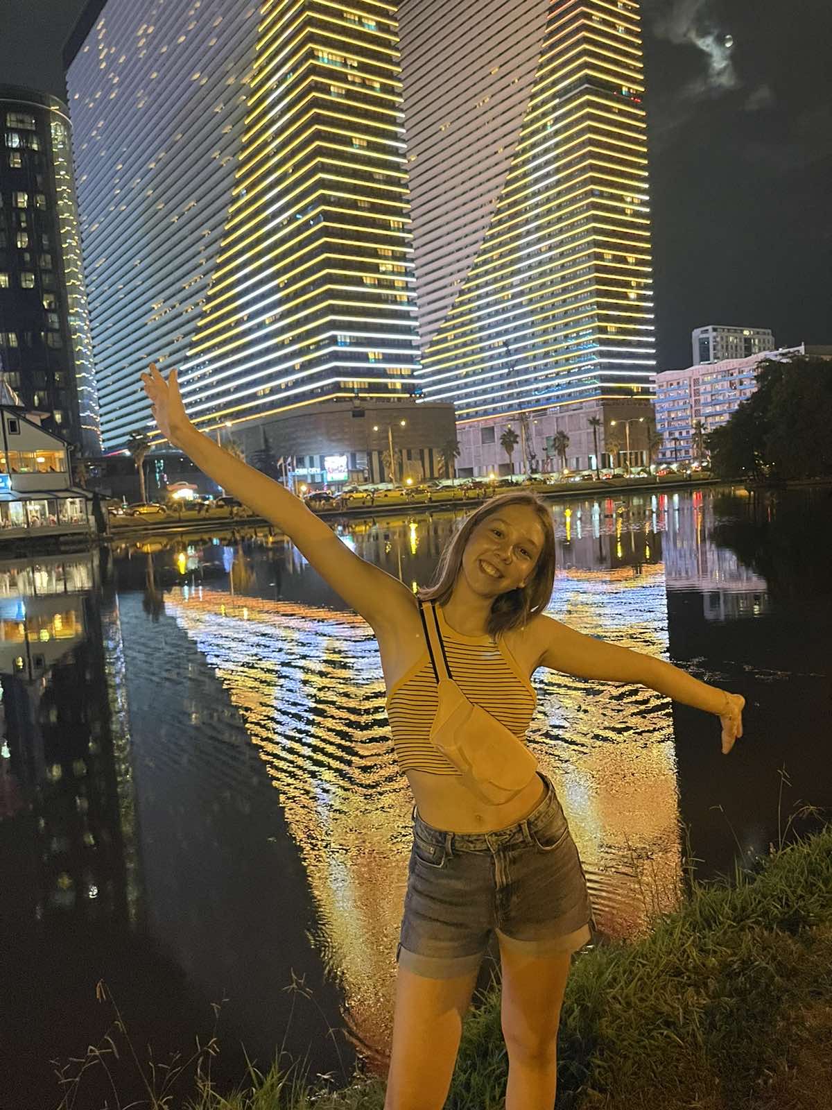 Full body shot infront of Two Towers in Batumi, Georgia - Potapenko Milana